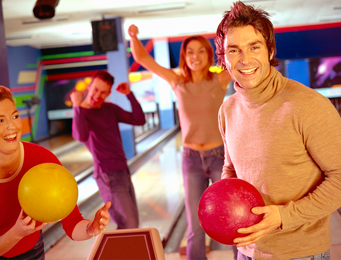 Group of people bowling